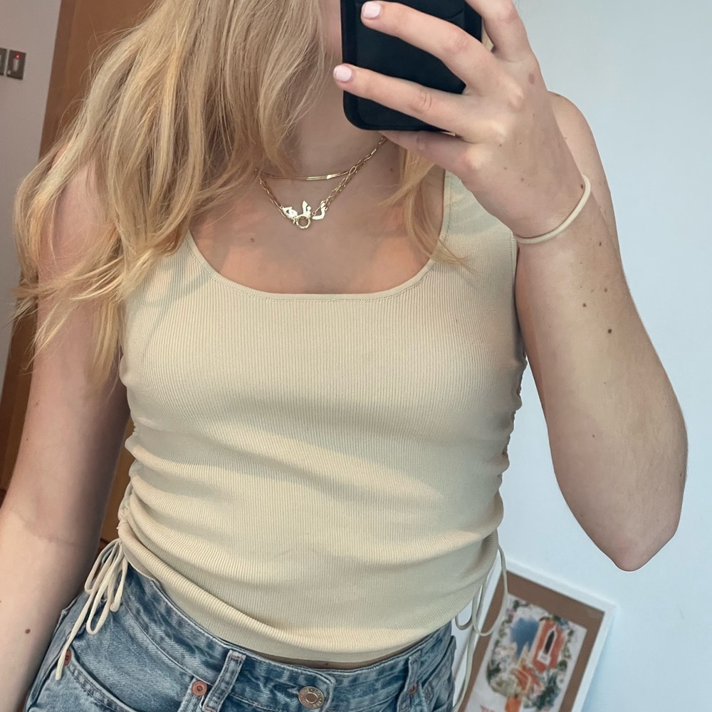 Cream color tank top with side ties from Mango